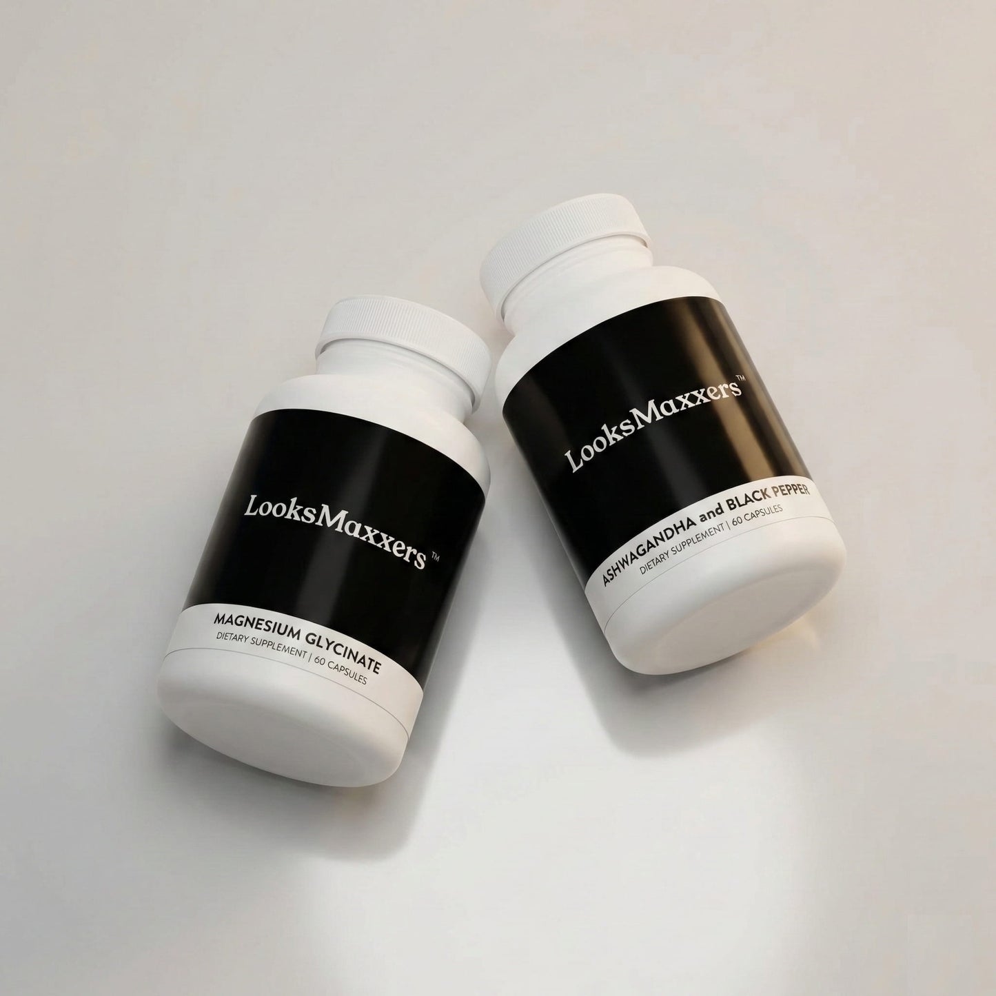 Two 'LooksMaxxers' supplement bottles on a light gray background