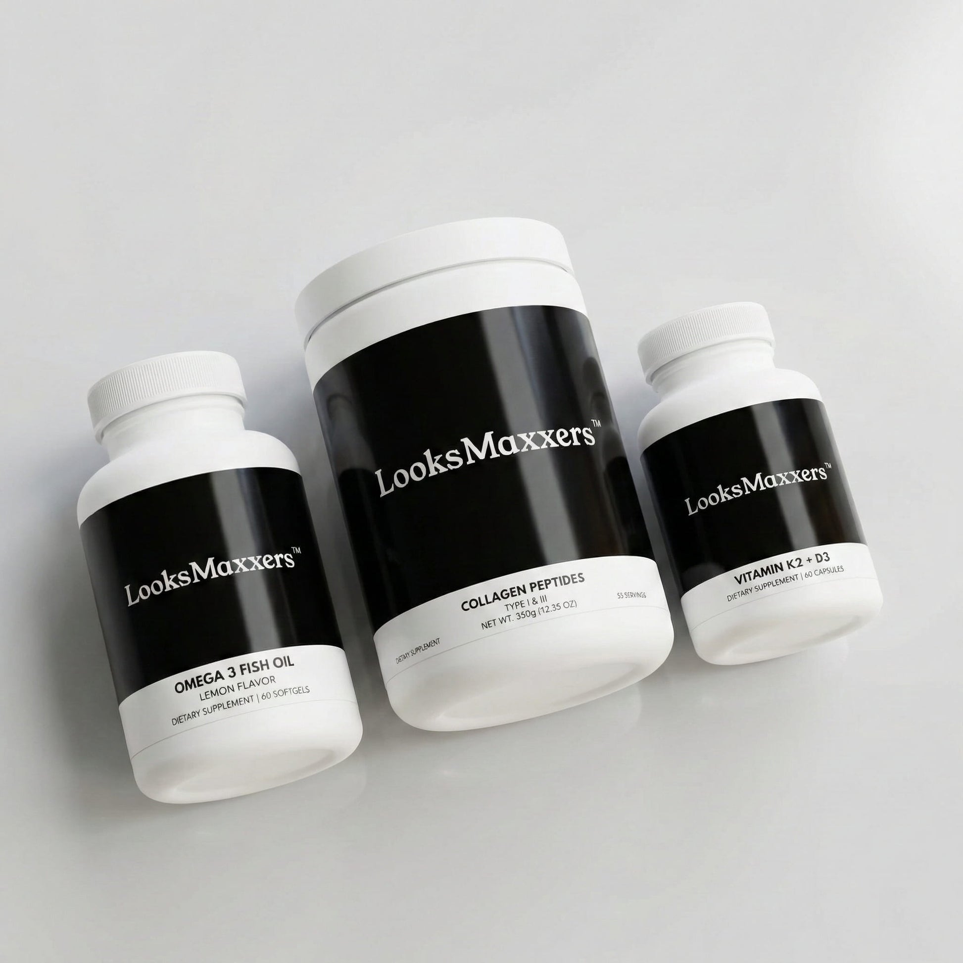 Three supplement bottles labeled 'LooksMaxxers' on a light gray background